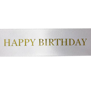 white ribbon with gold Happy Birthday text