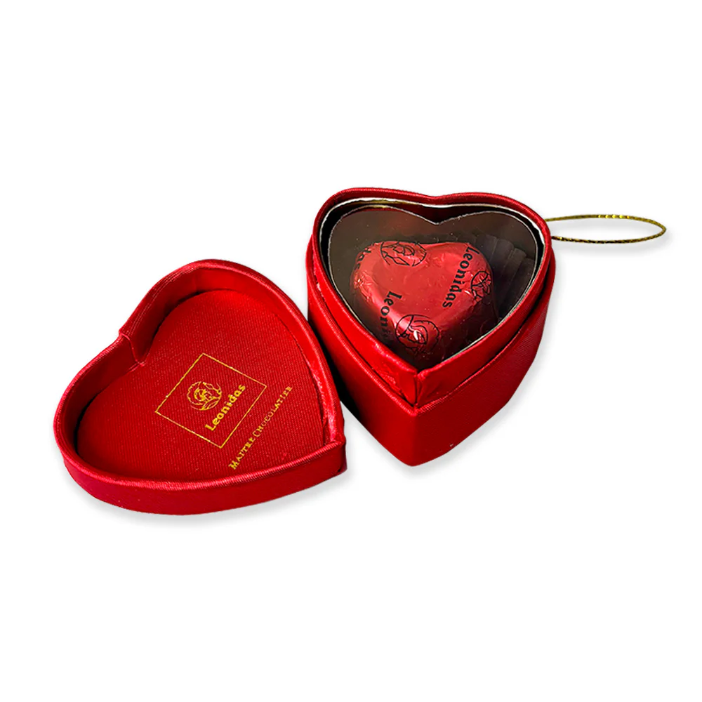 single chocolate heart in a red leonidas heart