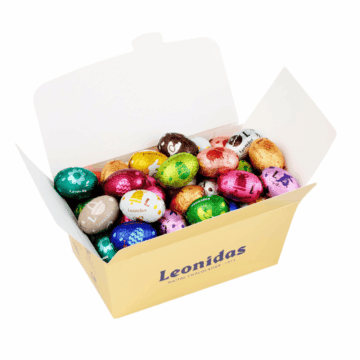 a gold ballotin of leonidas mini eggs