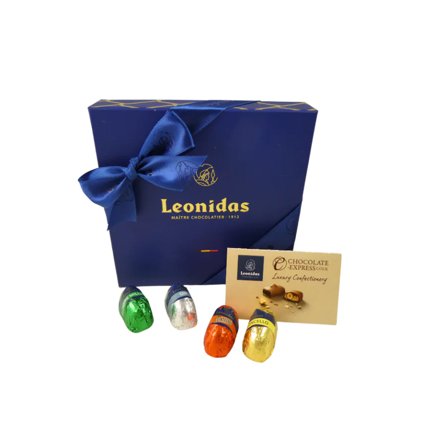 A blue Leonidas gift box with chocolate liqueurs in front.