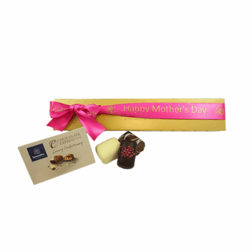 A gold tube gift box with a pink Mother's Day ribbon and Manon chocolate in front of.