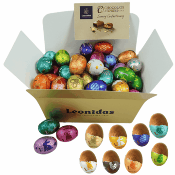 large gold box of leonidas milk chocolate mini eggs wrapped in colourful foil
