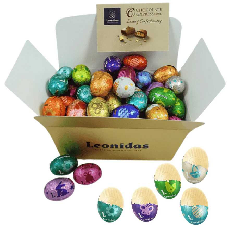 large gold box of leonidas white chocolate mini eggs wrapped in colourful foil