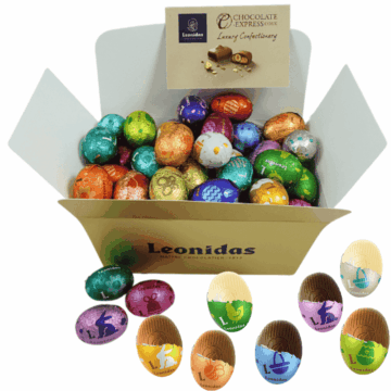 a large gold leonidas box filled with assorted chocolate mini eggs wrapped in colourful foil