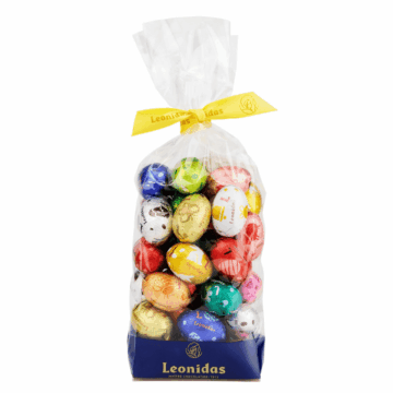 a gold leonidas box filled with assorted chocolate mini eggs wrapped in colourful foil