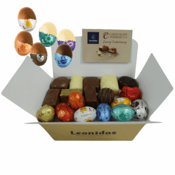 a large gold leonidas box filled with a mix of chocolates ad mini eggs