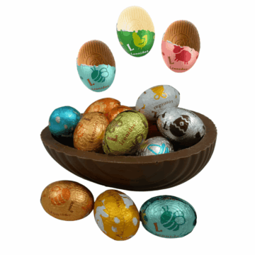 a milk chocolate egg shell filled with foil wrapped leonidas mini eggs