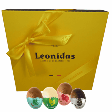 closed yellow leonidas box with yellow leonidas ribbon with mini eggs outside
