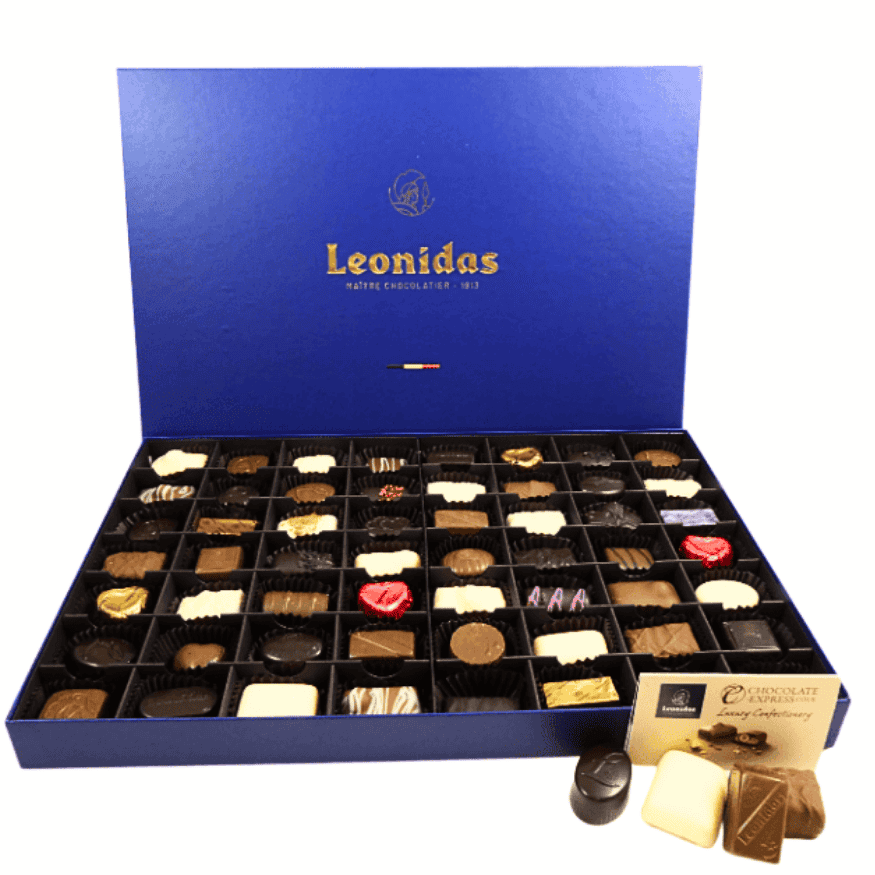 A large Leonidas premium box of chocolates in blue with an open lid and 56 chocolates.