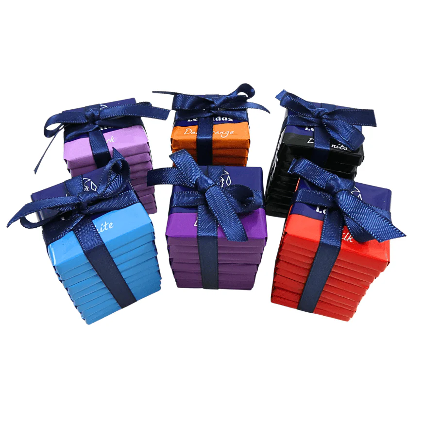 six bundles of individually wrapped napolitan squares, ties in blue ribbon
