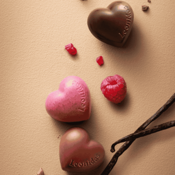 close up of 3 leonidas heart shaped chocolates