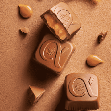 leonidas milk caramel chocolate cut in half