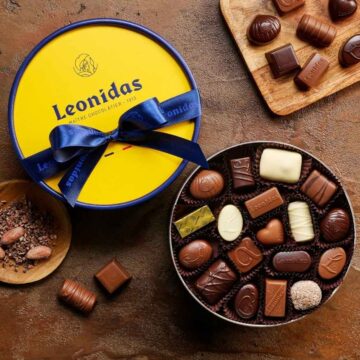 open round leonidas gift box filled with chocolates