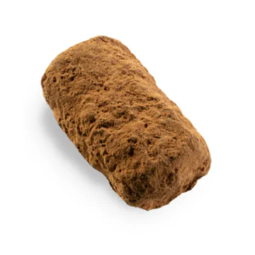 close up image of a leonidas milk chocolate powder truffle