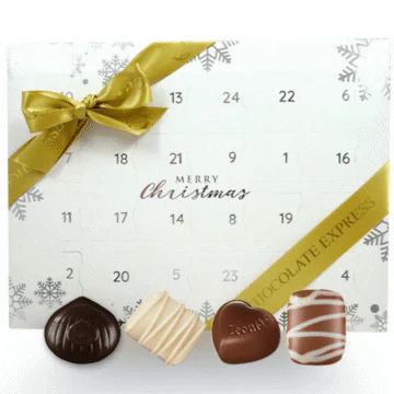 snowflake white advent calendar with leonidas chocolates in front