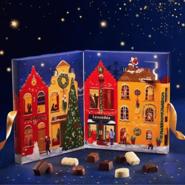 leonidas advent calendar open on a blue background with chocolates